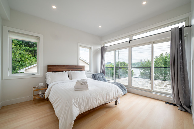 Professionally managed bedroom with hotel-quality linens and natural light